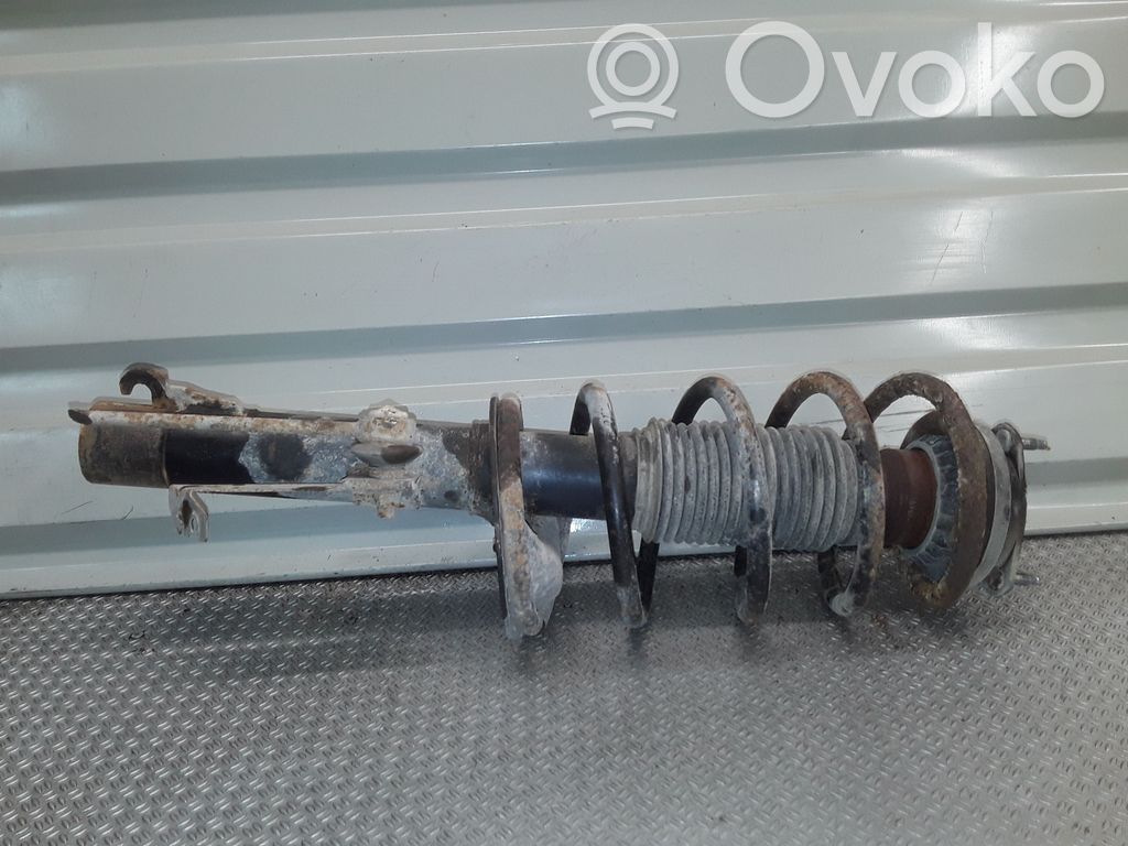 Front shock absorber with coil spring