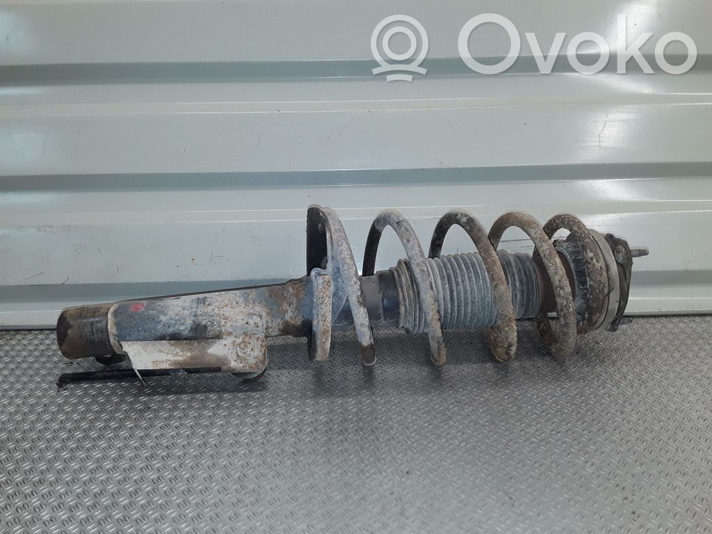 Front shock absorber with coil spring