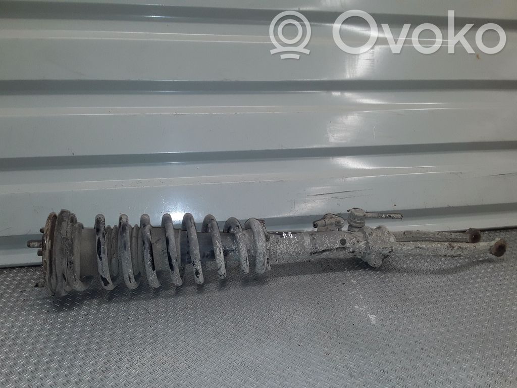 Front shock absorber with coil spring