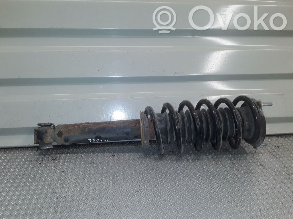 Front shock absorber with coil spring