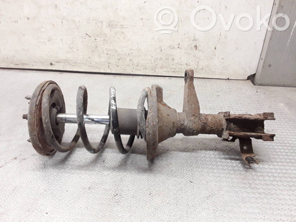 Front shock absorber with coil spring