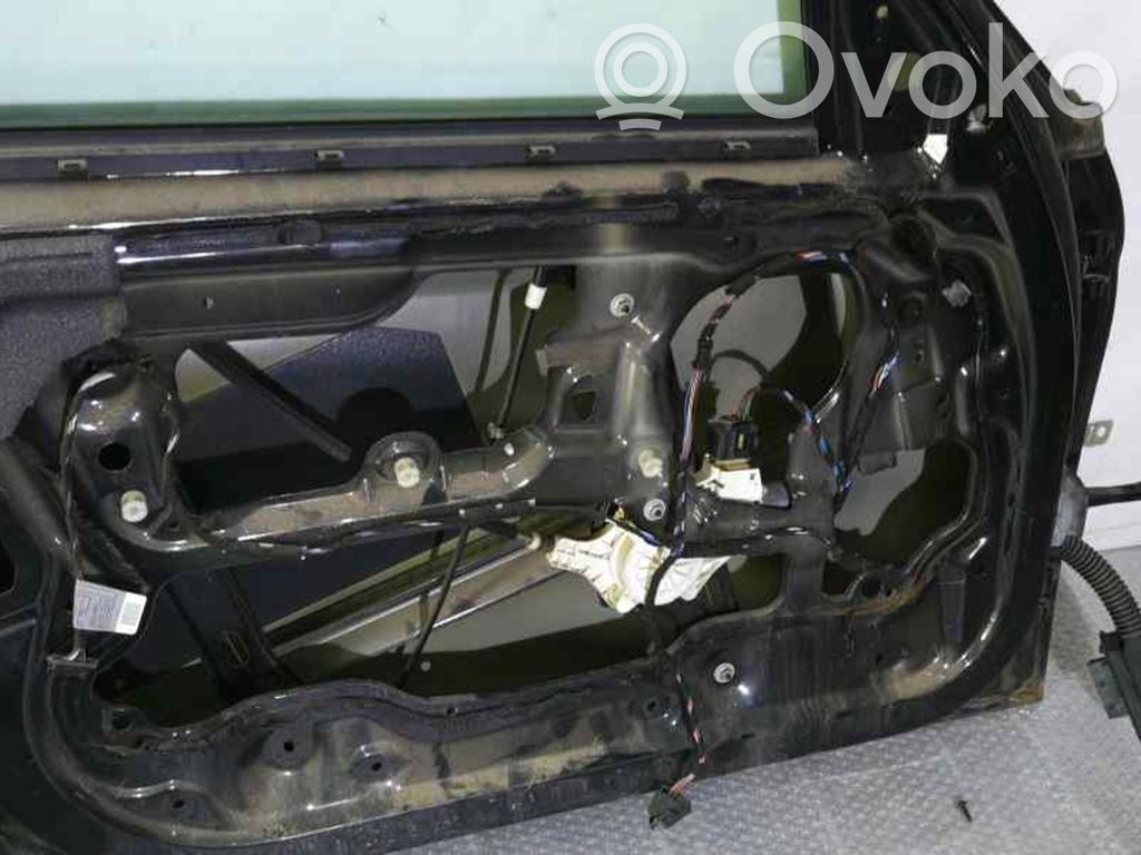 Regulador de puerta delantera con motor