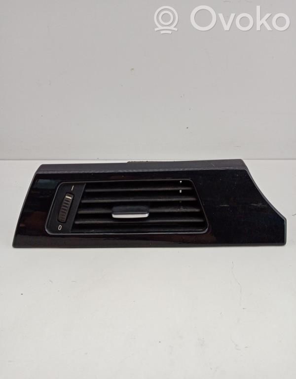 Dash center air vent grill   642291304599,ESQUERDO14482110