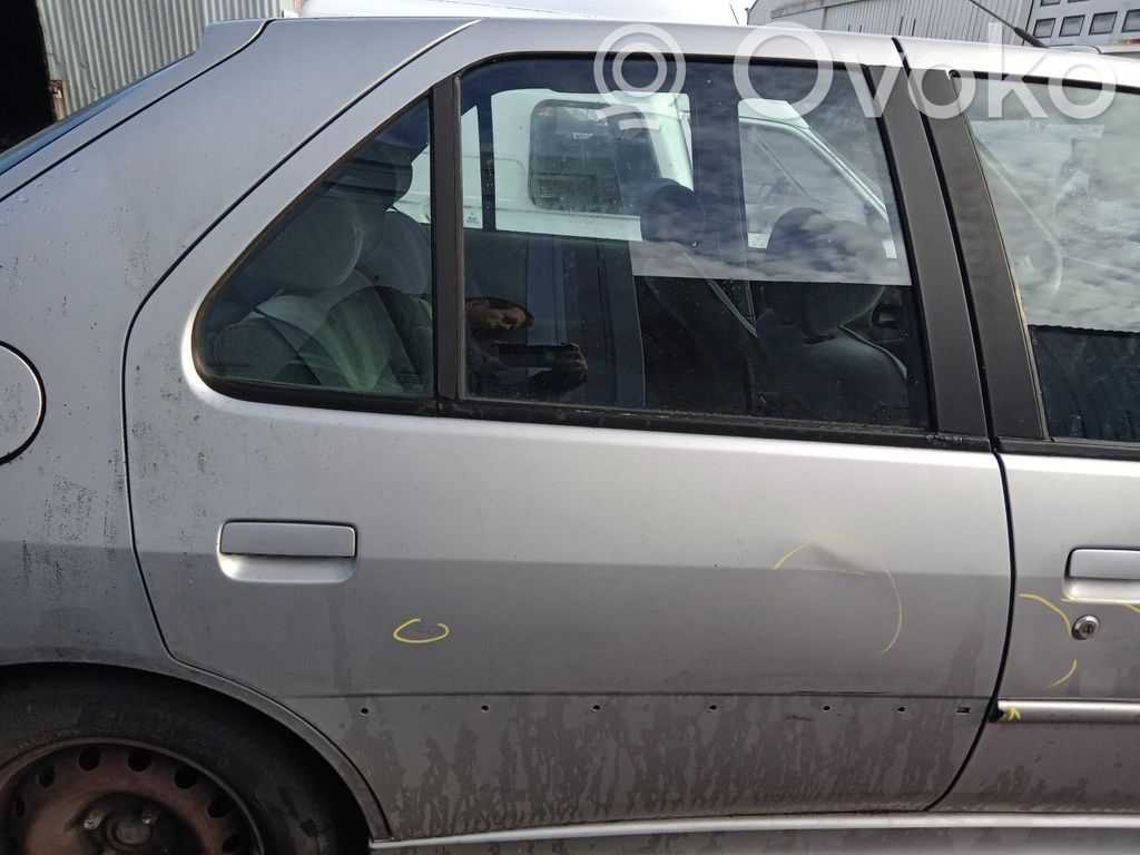 Peugeot 306 Ventanilla de ventilación de la puerta trasera 