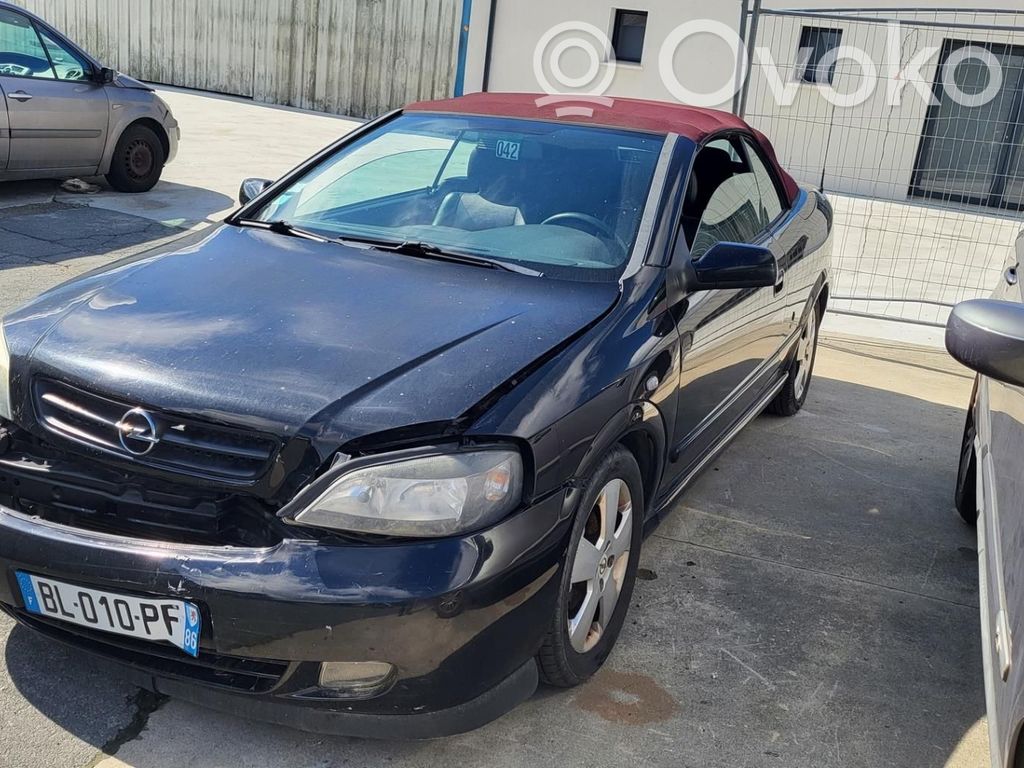 Opel Astra G Zacisk hamulcowy przedni 