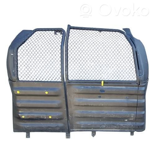 Partition between cabin