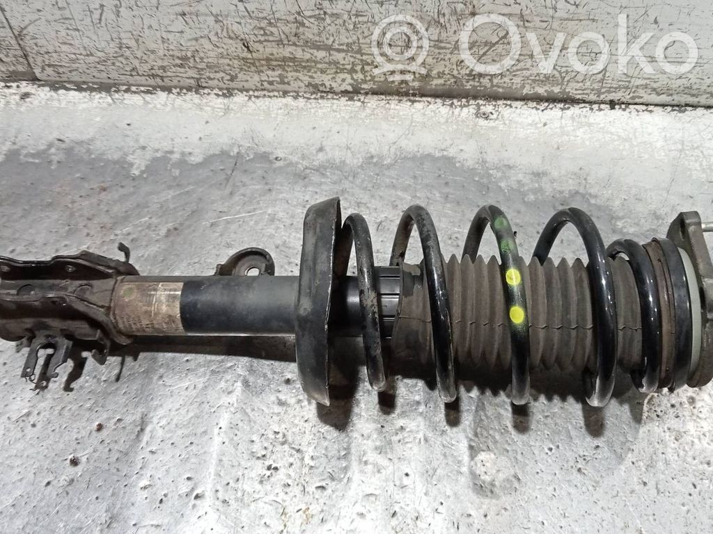 Opel Combo C Amortyzator osi przedniej ze sprężyną 