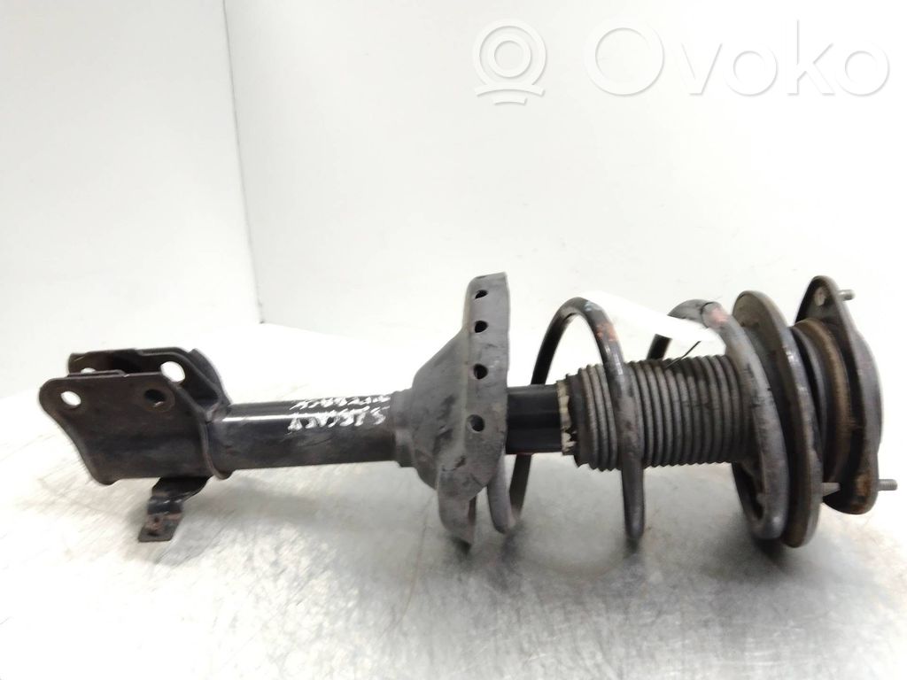 Front shock absorber with coil spring