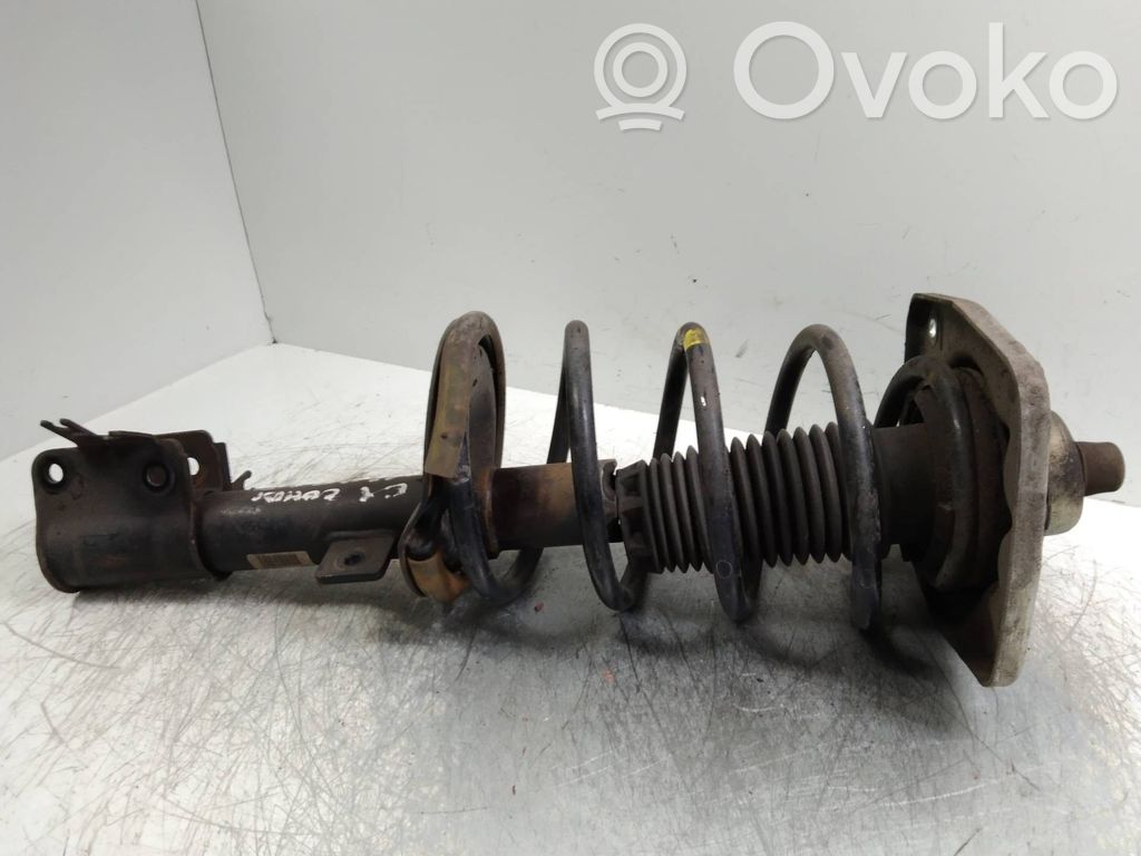 Front shock absorber with coil spring