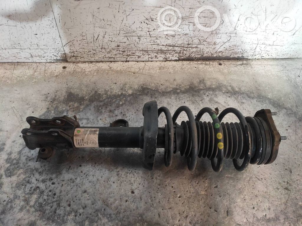 Opel Combo C Amortyzator osi przedniej ze sprężyną 