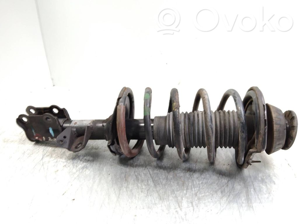 Front shock absorber with coil spring