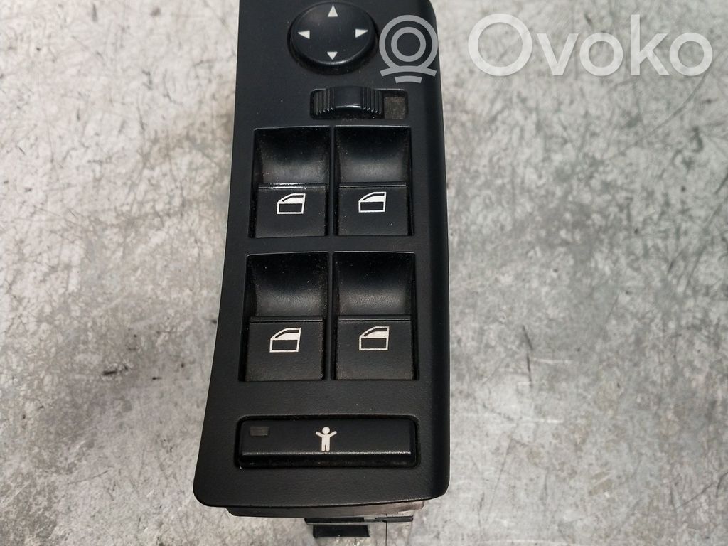 Electric window control switch   6907499