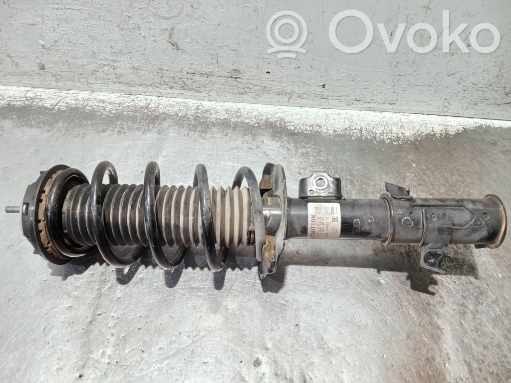 Ford Puma Front shock absorber with coil spring 