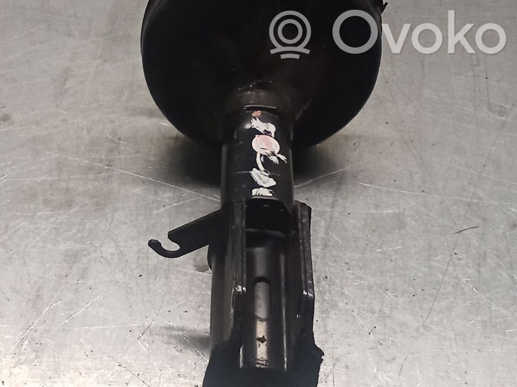 Renault Clio III Front shock absorber with coil spring 