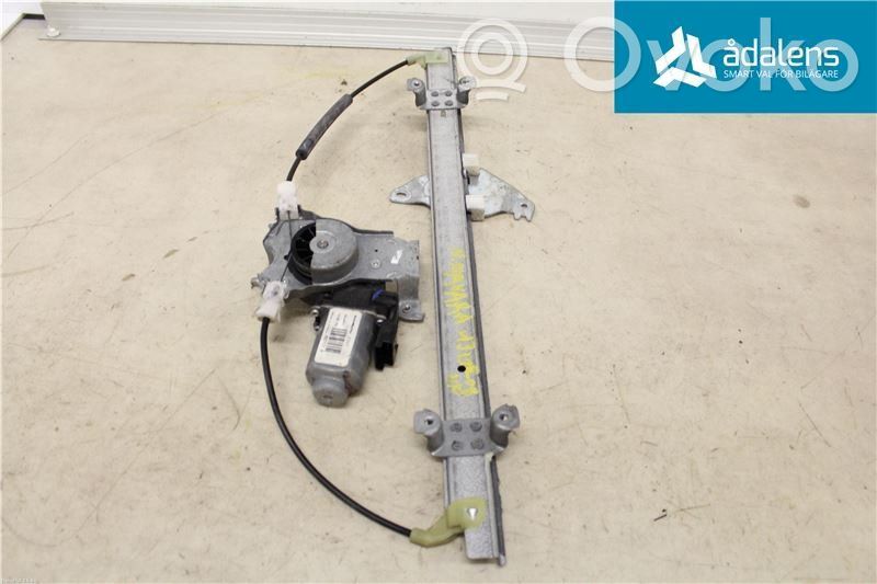 Nissan Navara D40 Elektryczny podnośnik szyby drzwi przednich 