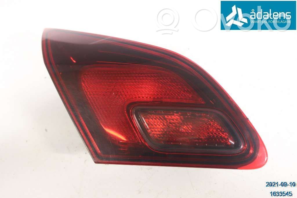 Opel Astra J Galinis žibintas dangtyje 