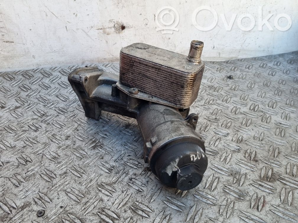 Oil filter mounting bracket   7787072,7787698