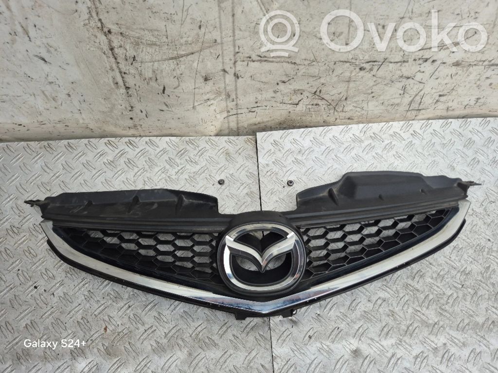 Mazda 5 Front bumper upper radiator grill 