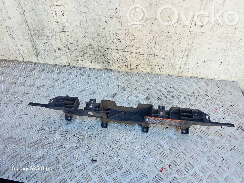 Opel Astra J Uchwyt / Mocowanie zderzaka przedniego 