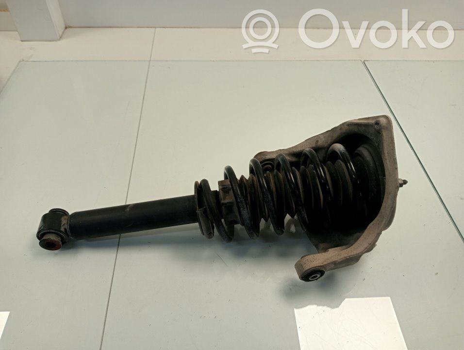 Front shock absorber with coil spring