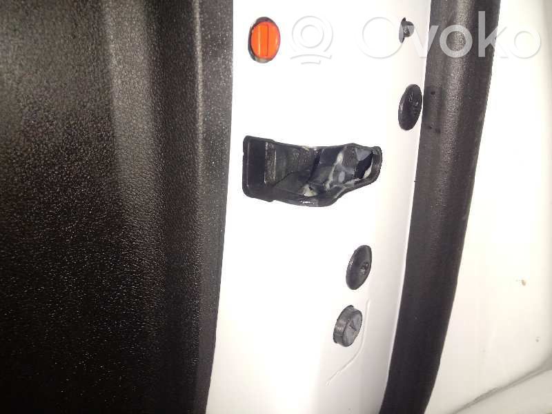 Cerradura de puerta trasera