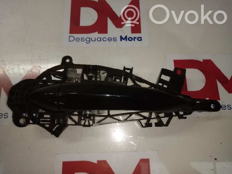 Manecilla externa puerta trasera