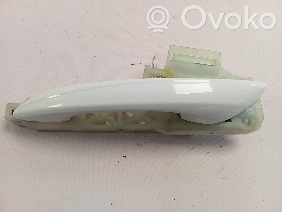 Manecilla externa puerta trasera