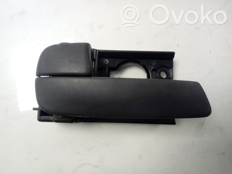 Rear door interior handle
