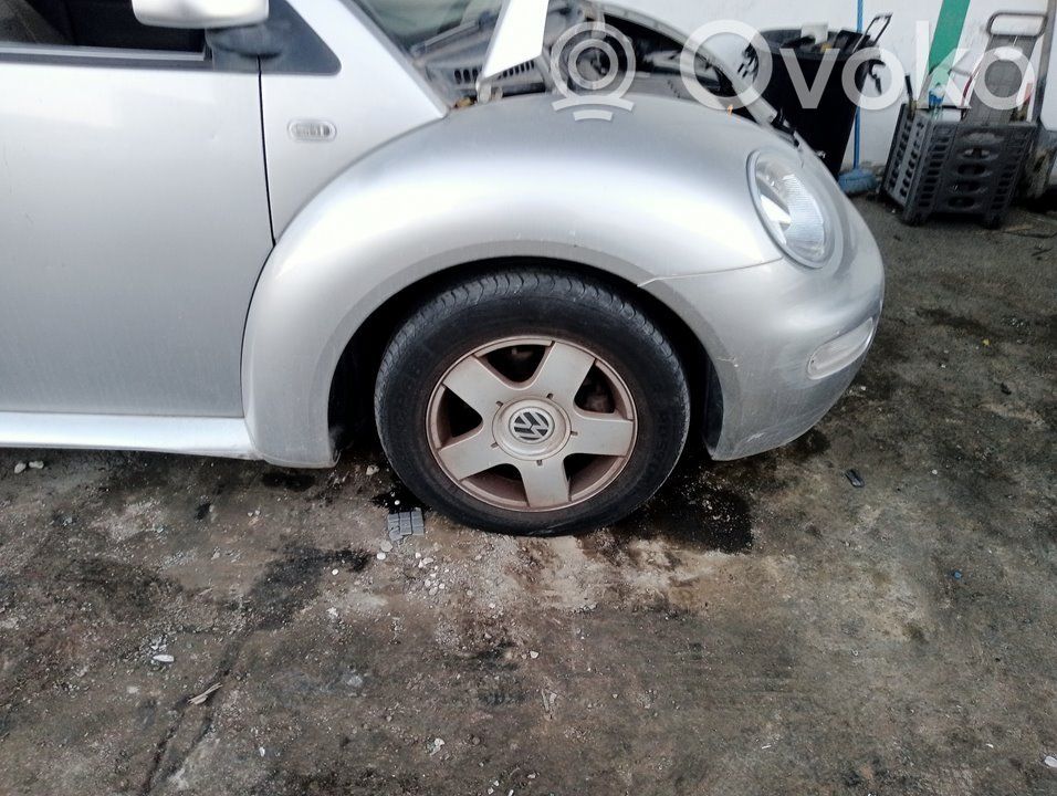 Volkswagen New Beetle Lokasuoja 