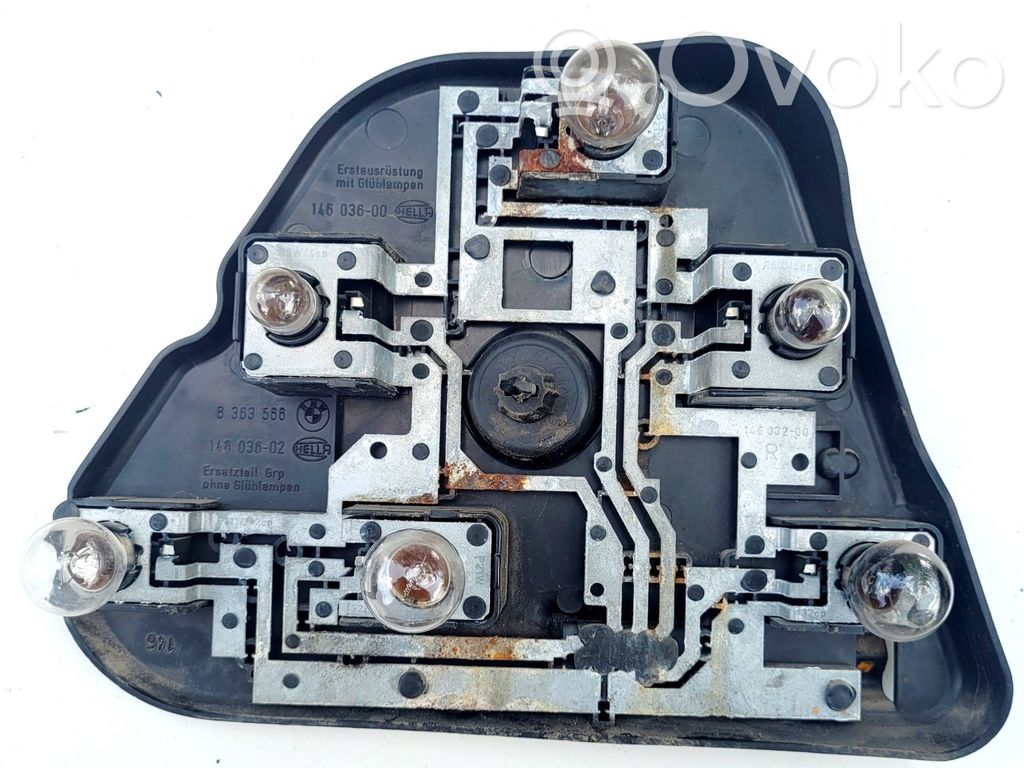 Tail light bulb cover holder