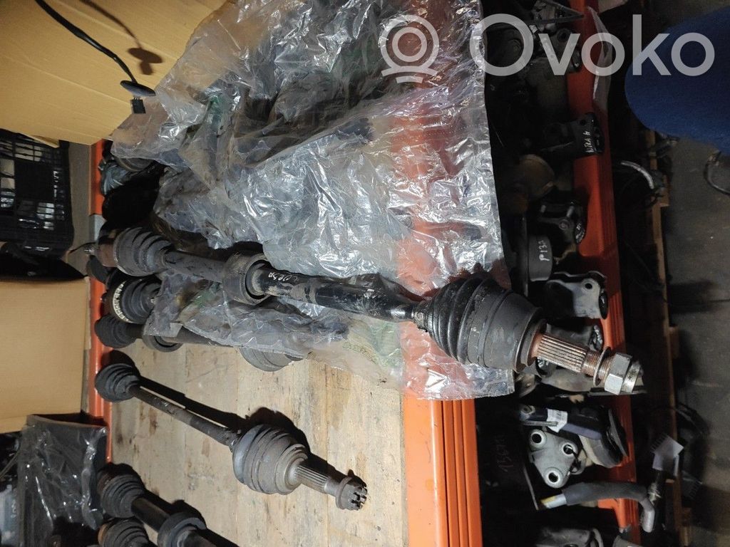 Opel Corsa D Eje de transmisión delantero 