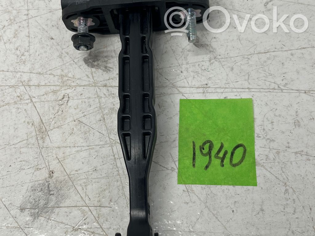 Front door check strap stopper   1500682