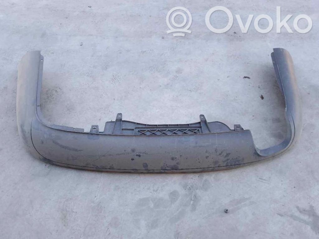 Volkswagen PASSAT Protector/cubierta de la carrocería inferior del parachoques trasero 
