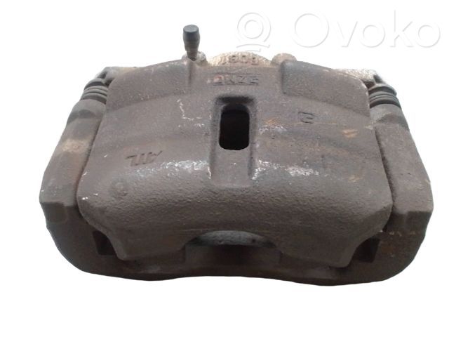 Nissan Qashqai Zacisk hamulcowy przedni 