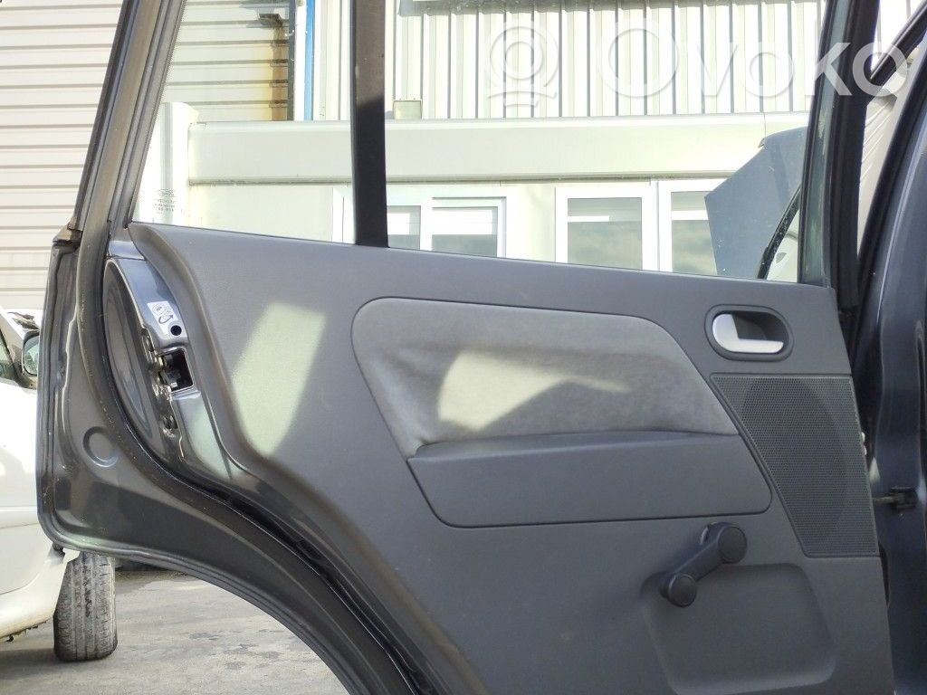 Ford Fusion Ventanilla de ventilación de la puerta trasera 