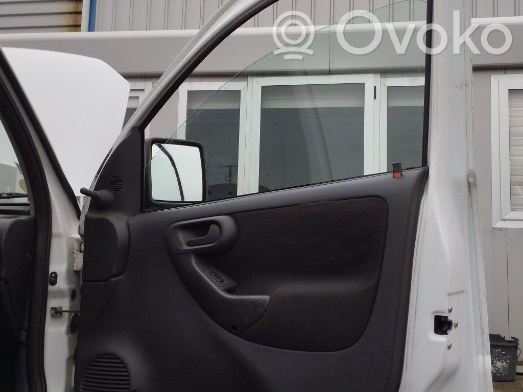 Opel Combo C Elektryczny podnośnik szyby drzwi przednich 