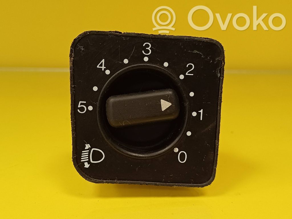 Headlight level height control switch