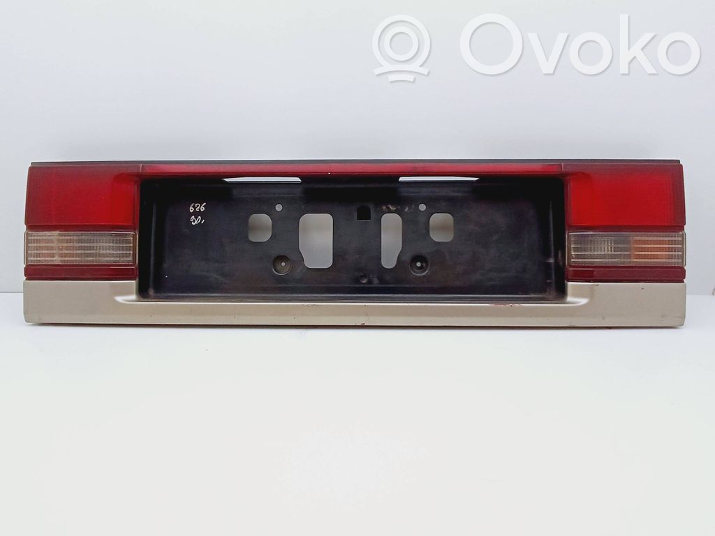 Mazda 626 Trunk door license plate light bar 