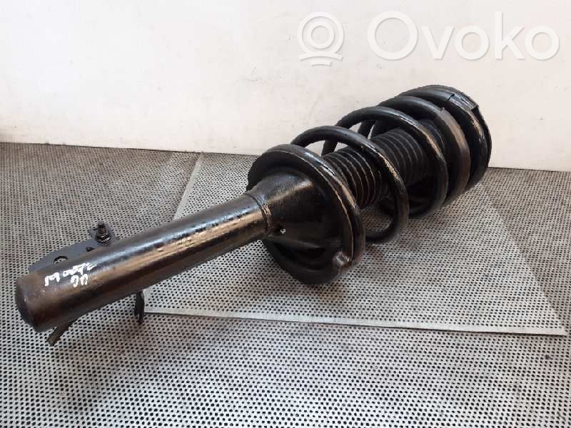 Front shock absorber with coil spring