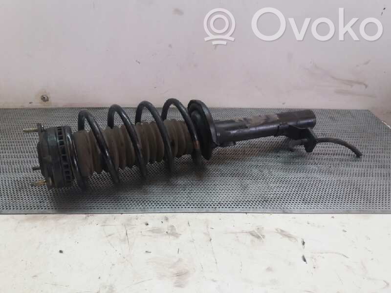 Front shock absorber with coil spring