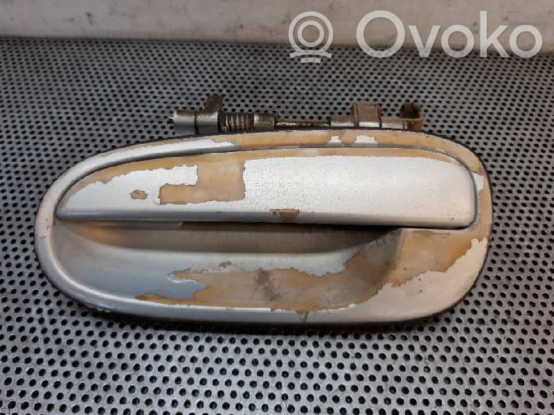 Manecilla externa puerta trasera