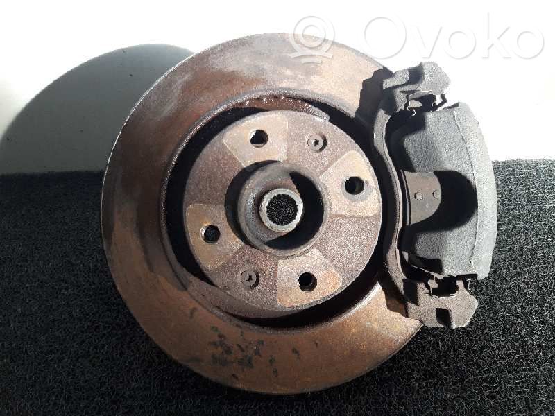 Front wheel hub spindle knuckle