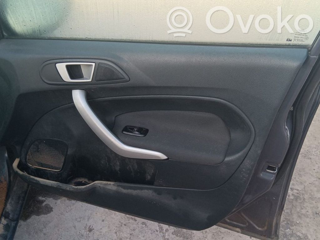 Ford Fiesta Elektryczny podnośnik szyby drzwi przednich 