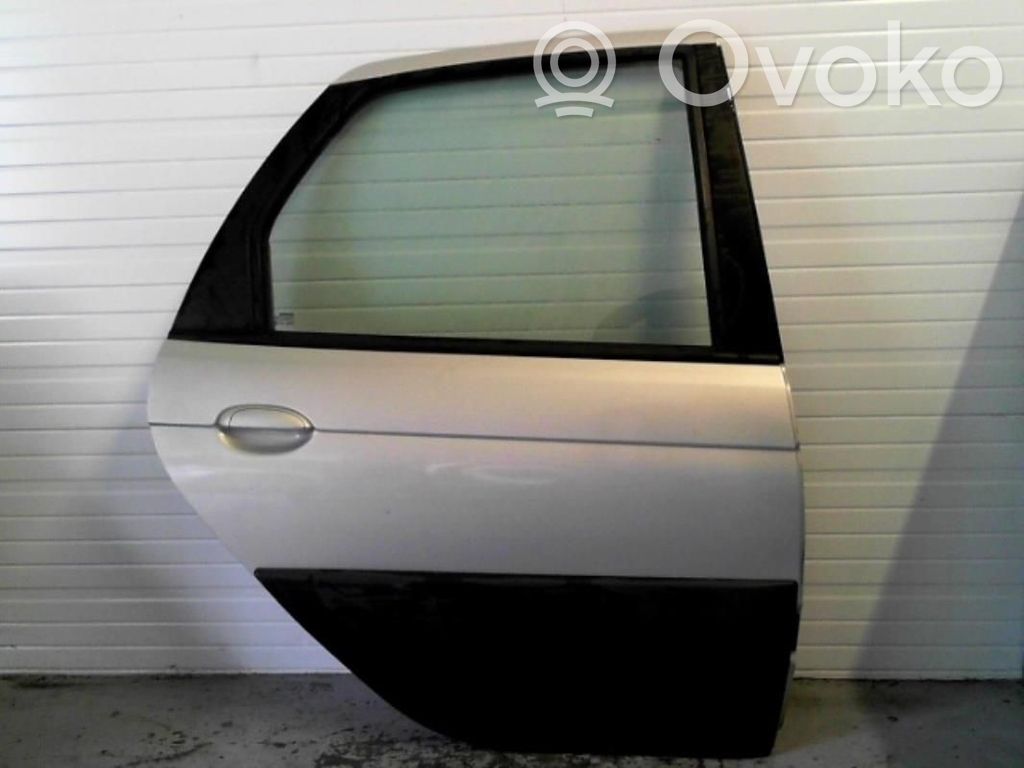 Puerta trasera   7751472408