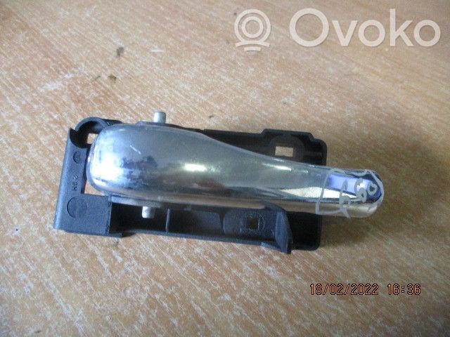 Manecilla interna puerta delantera   99098401