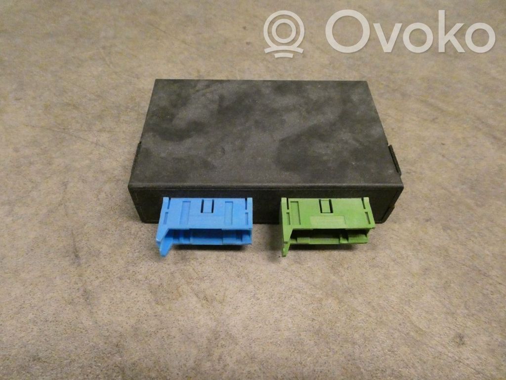 BMW 5 E34 Komforto modulis 