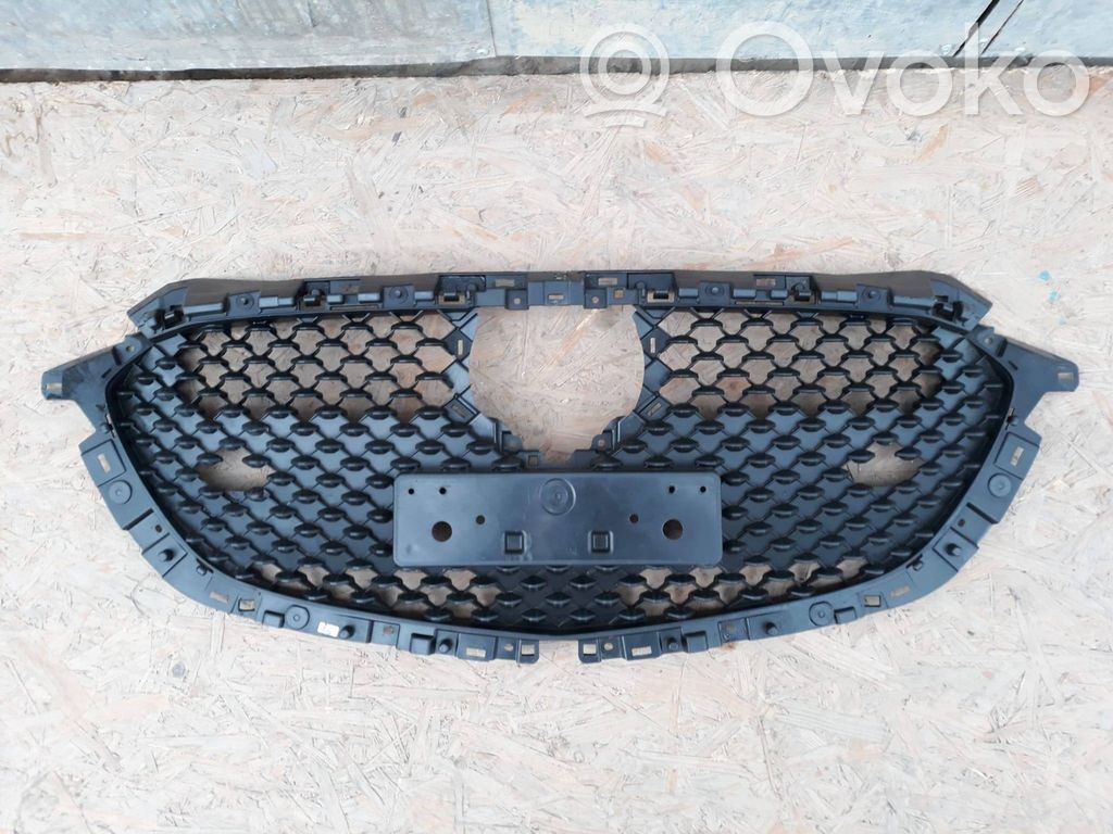 Mazda Demio Front bumper upper radiator grill 