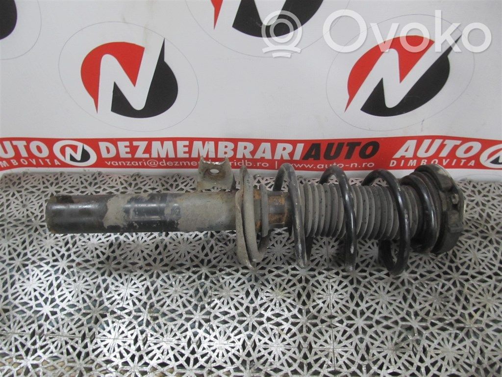 Amortyzator osi przedniej ze sprężyną   1T0413031GK
