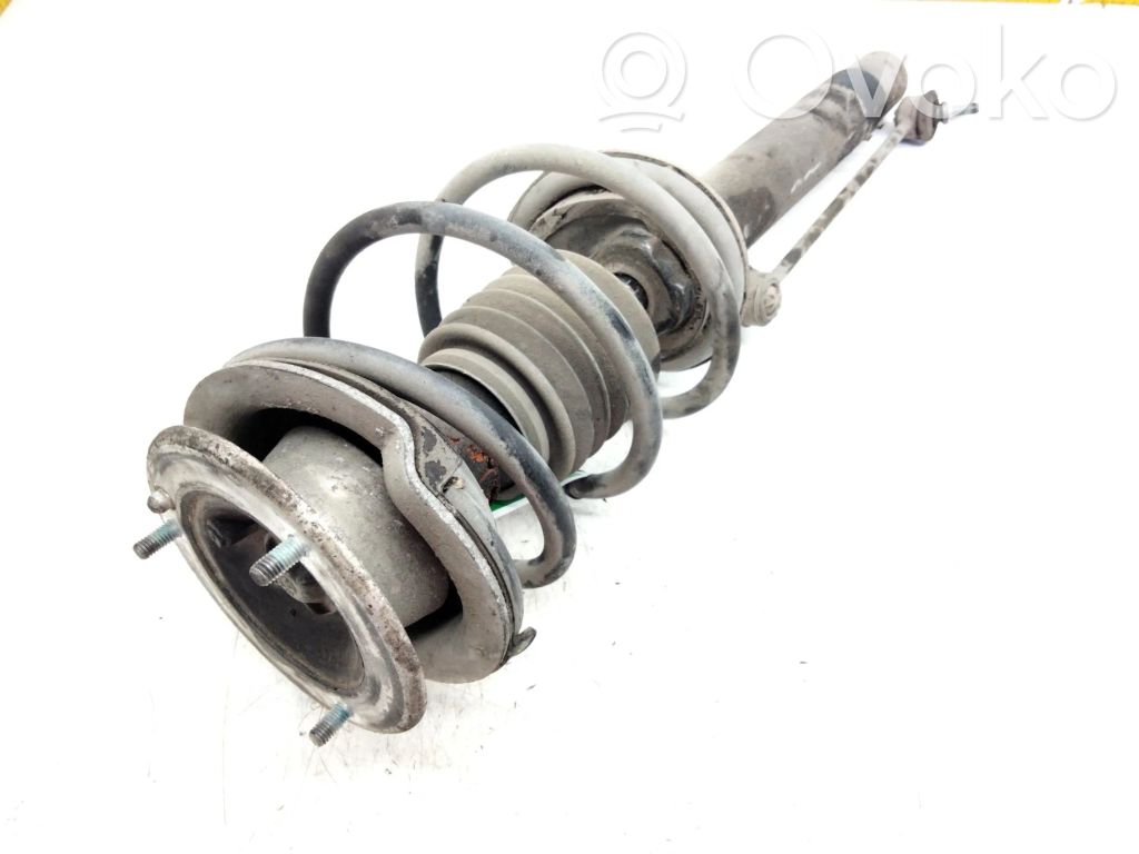 Front shock absorber with coil spring   6750789