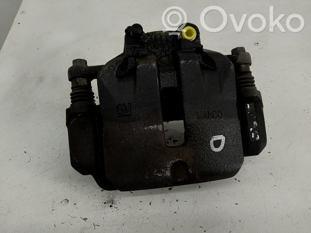 Opel Insignia A Zacisk hamulcowy przedni 